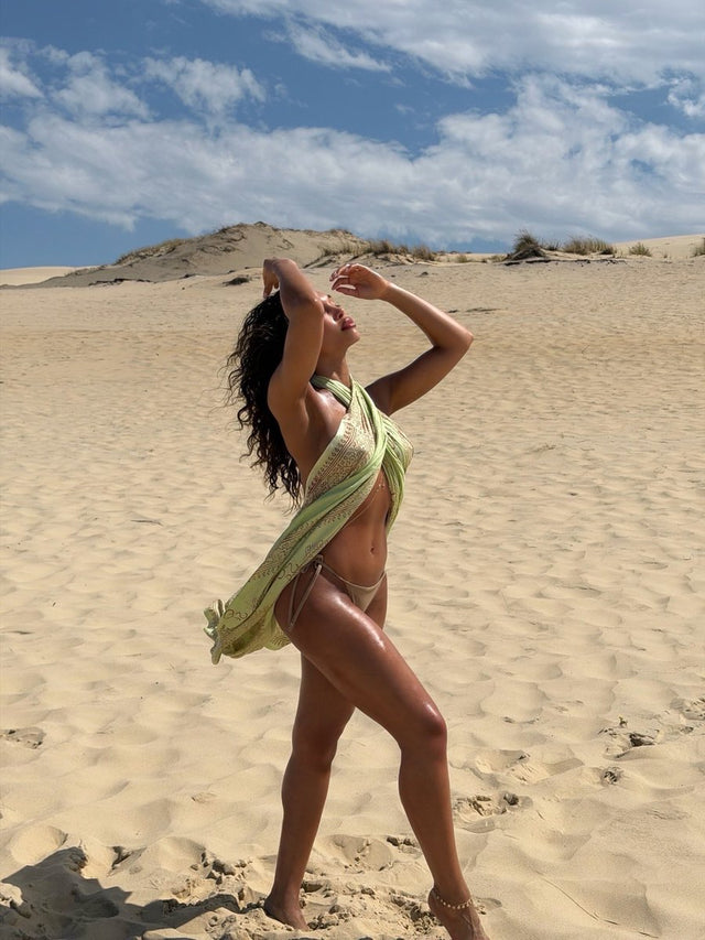 Still Summering Lori Harvey topless beach trend 2026