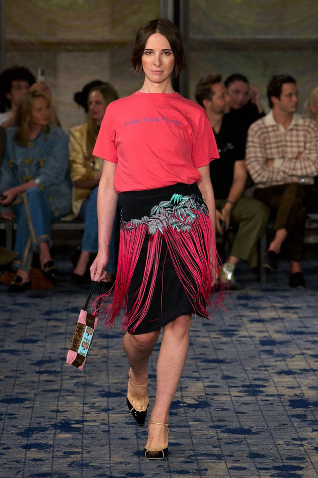 Hari Nef wearing Bring Back Shame tee at Conner Ives SS27