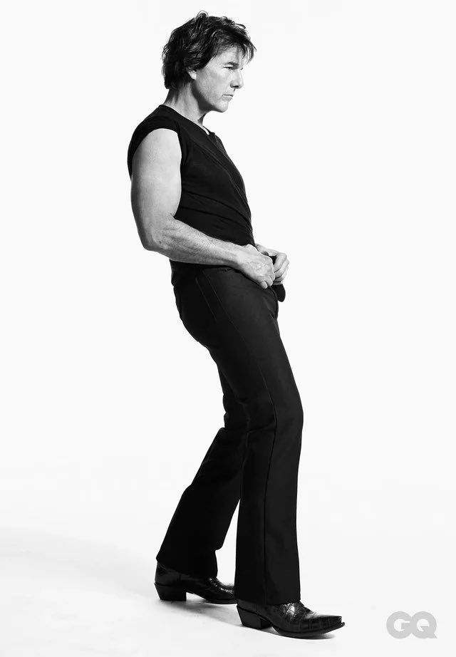 Tom Cruise GQ magazine cover 2026 showing abs at age 64