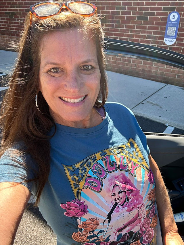 Fan wearing Dolly Parton tribute T-shirt on Dolly Parton Day