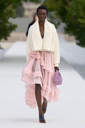 Dior SS27 runway undone bra under open jacket look Paris Fashion Week